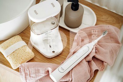 Adler | 2-in-1 Water Flossing Sonic Brush | AD 2180w | Rechargeable | For adults | Number of brush heads included 2 | Number of teeth brushing modes 1 | White