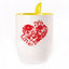 A cup with a spoon. Yellow (250 ml)