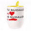 A cup with a spoon. Yellow (250 ml)