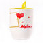 A cup with a spoon. Yellow (250 ml)