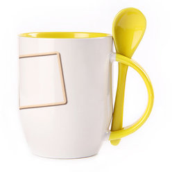 A cup with a spoon. Yellow (250 ml)