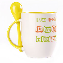 A cup with a spoon. Yellow (250 ml)