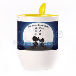 A cup with a spoon. Yellow (250 ml)