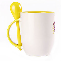 A cup with a spoon. Yellow (250 ml)