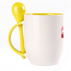 A cup with a spoon. Yellow (250 ml)