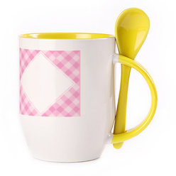 A cup with a spoon. Yellow (250 ml)