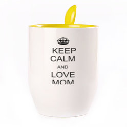 A cup with a spoon. Yellow (250 ml)