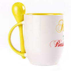 A cup with a spoon. Yellow (250 ml)