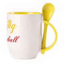 A cup with a spoon. Yellow (250 ml)