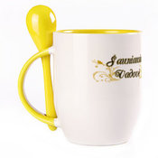 A cup with a spoon. Yellow (250 ml)